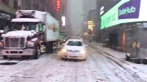 Eastern daylight time (north america)edt. Snowing in Times Square New York City February 9th 2017 ...