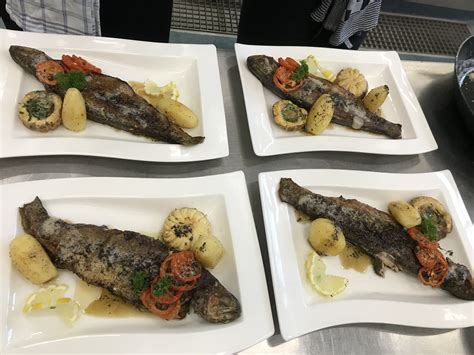 Trout With Potatoes Mushrooms And Tomato