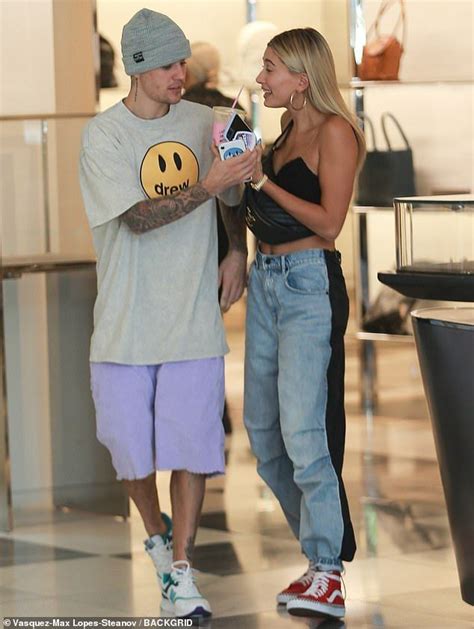 justin bieber rocks his drew label as he shops in beverly hills with his wife hailey daily
