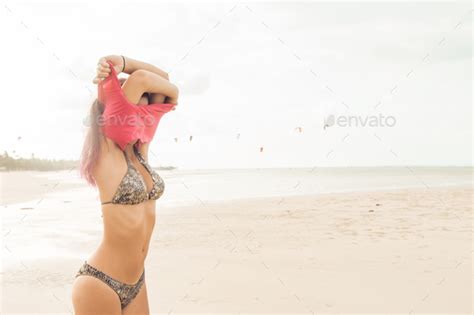 Sexy Girl Undress On The Beach Stock Photo By Nikkolia Photodune