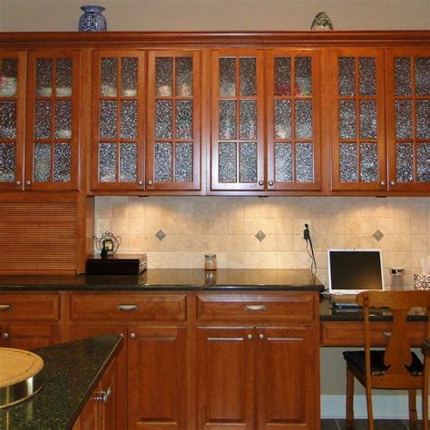 This can be done to add flair to the cabinets, or to upgrade the cabinet for holding china, glass items 7. Doors With Frosted Glass Inserts | Glass kitchen cabinet ...