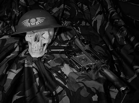 Cambrian Expeditionary Force helmet, Las Pistol and Camo Cloak. Next