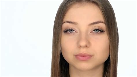 Close Up Of Face Of Beautiful Young Woman Slow Motion Stock Video