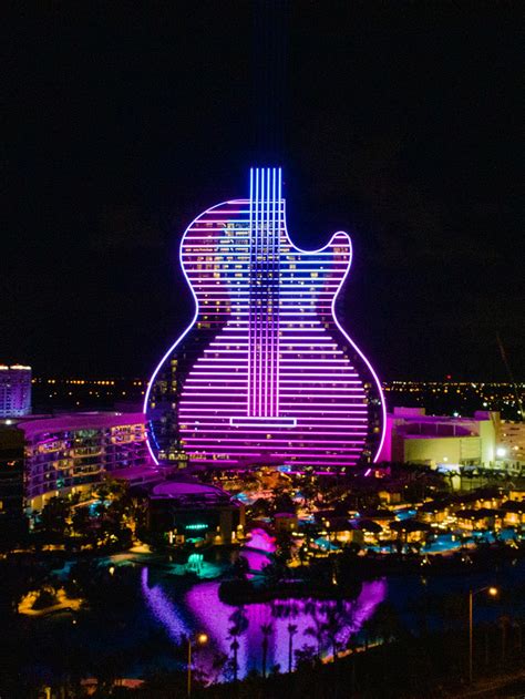 hard rock opens neon guitar shaped hotel in florida