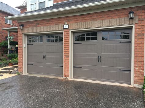 8x7 Clopay Steel Insulated Bronze Carriage Doors With True Arch Windows