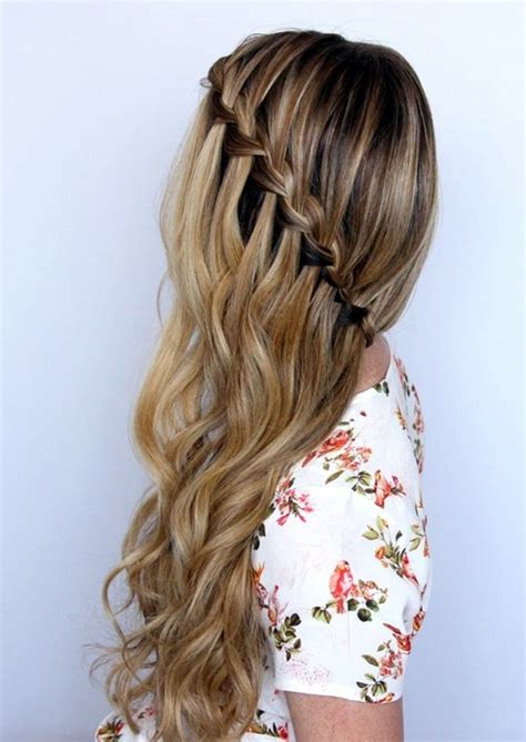 You can make this one as boho as you want it to go by loosely pulling out the bubble braids one by one. 45 Easy Half Up Half Down Hairstyles for Every Occasion