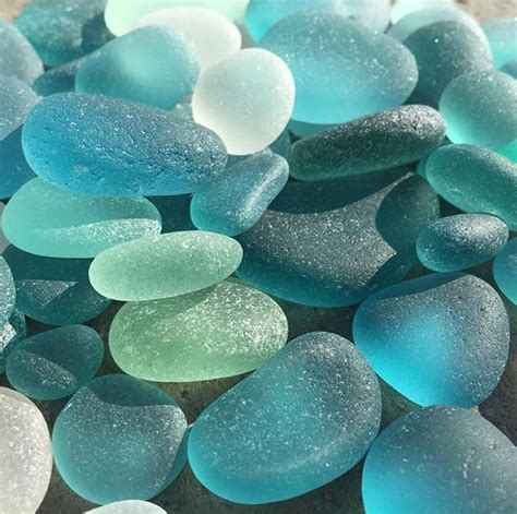 Blue And Green Sea Glass Pebbles On The Beach