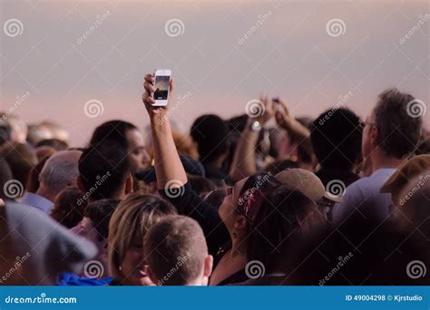 Crowd Taking Pictures With Cell Phones Event Editorial Stock Photo