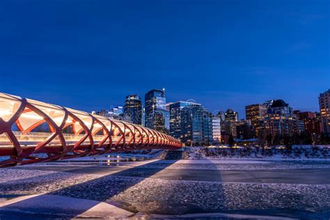 Calgary S Skyline Along The Bow River Editorial Photo Image Of Bridge