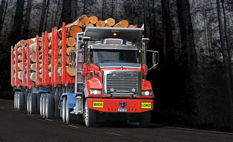 Mills Tui Trailers Carrying A Mighty Load Of Logs • Mills Tui
