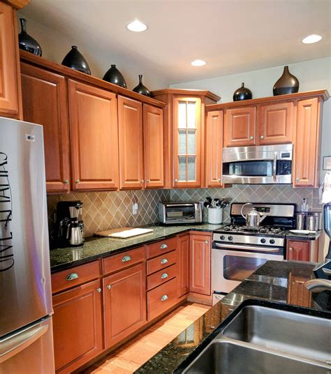 Features three working drawers, with a storage cabinet beneath each drawer. How To Beautify Your Kitchen Cabinets With New Hardware ...