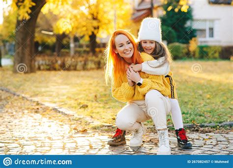 Mom And Girl Laughing Outdoors Autumn Fashion Stock Image Image Of