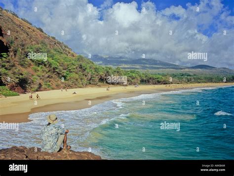 Tourist Looks Out At Big Beach At Makena State Park On Maui Stock Photo