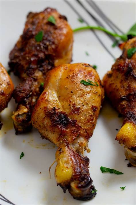 Fried chicken is often a family favorite but can be an involved and messy process. Marinated chicken drumsticks that have been baked in the ...