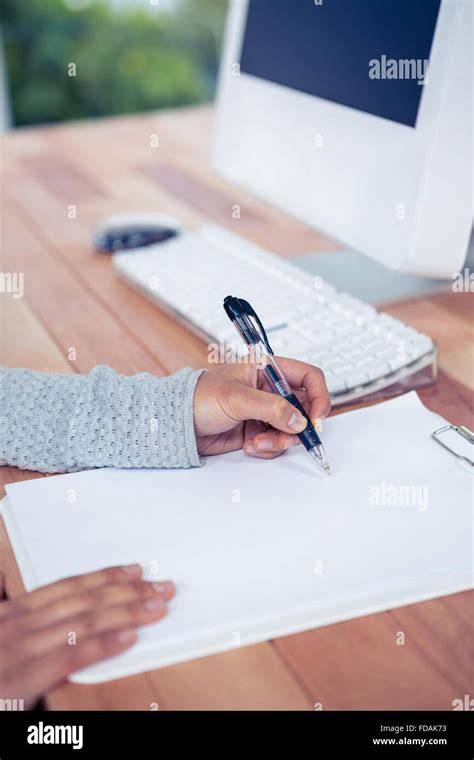 Womans Hand Writing With Pen On White Sheet Stock Photo Alamy