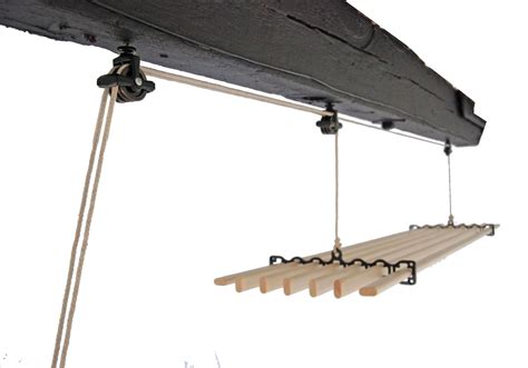 Our hand made timber rack is suspended on pulleys from the ceiling. Seven Lath Gismo Clothes Airer - Urban Clotheslines