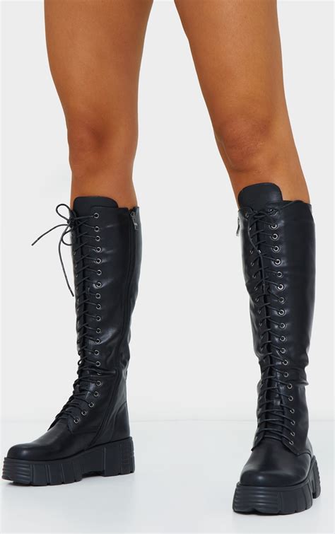 black knee high lace up textured sole chunky boots prettylittlething