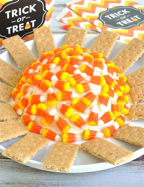 Candy Corn Cheesecake Cheese Ball Recipe That Features White Orange And Yellow Layers Just
