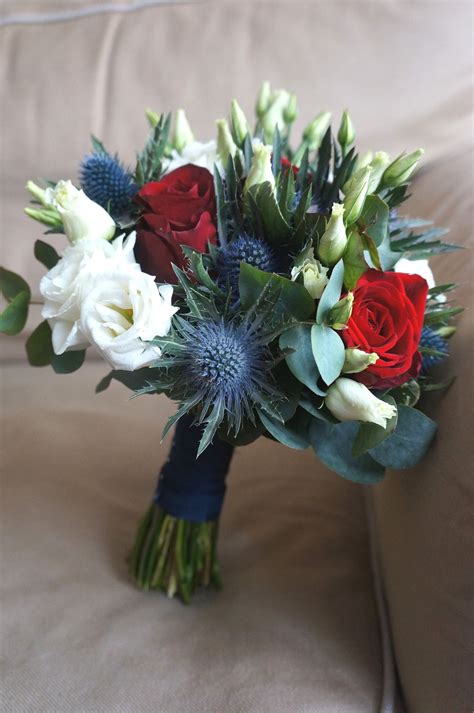 blue white red bridal bouquet lisianthus roses and thistles prom flowers bouquet blue