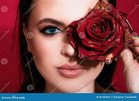 Young Beautiful Stylish Sensual Woman With Blue Eyes And Rose Woman With Red Lips And Rose