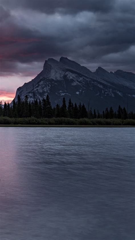 White And Red Clouds Under Mountain In Front Of Lake During Sunset Time