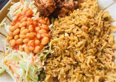 Let us learn how to prepare jollof rice. How to Make Appetizing Jollof rice,salad and grilled chicken - Easy Recipe Guide