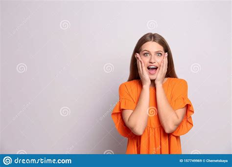 Portrait Of Surprised Young Woman On White Stock Image Image Of