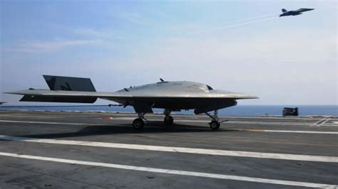 [video] U S Navy X 47b Drone And F A 18 Hornet Conduct Historic Combined Manned Unmanned