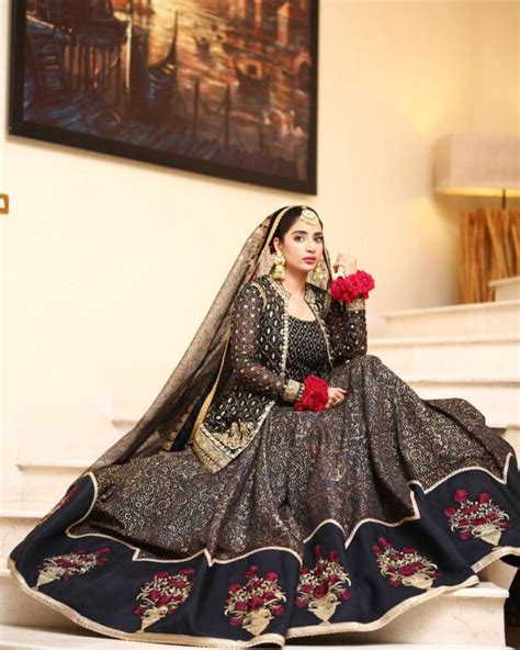 Saboor Aly Looks Ravishing In A Deep Red Bridal Jora Lens