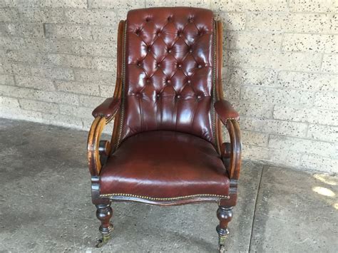 Enjoy free shipping on most stuff, even big stuff. Antique Maroon Tufted Leather Chair On Casters