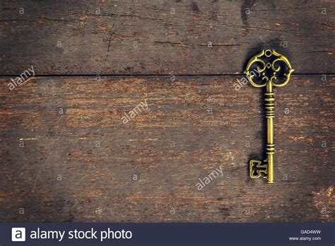 🔥 Download Old Vintage Key On Wood Texture Background With Space Stock