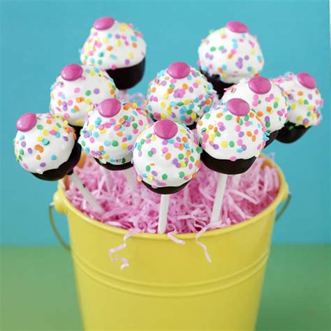 Then, set pops on a cookie tray. how to make cake pops - Love From The Oven