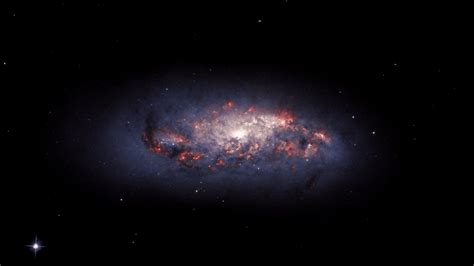Incandescent Galaxy With Dirty Brown Clouds With Black Sky Background