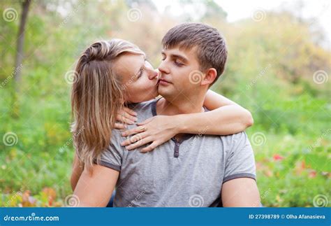 Girl Kiss A Guy On The Cheek Royalty Free Stock Images Image 27398789
