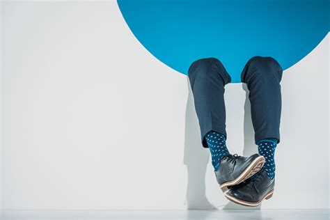 Closeup Partial View Of Stylish Man Falling Into Hole On Grey Stock