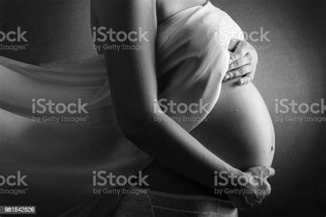 Pregnant Woman Black And White Photo Of Pregnancy In The Eighth Monthpregnant Woman Belly