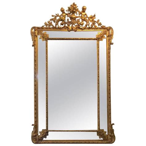French Gold Gilt Mirror With Cherubs And Beveled Glass At 1stdibs