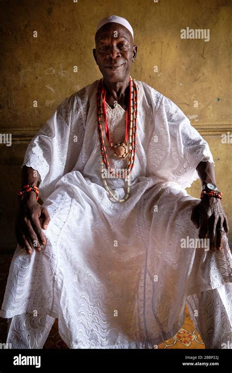 Portrait Of A Yoruba Priest With Traditional Amulets Robes And