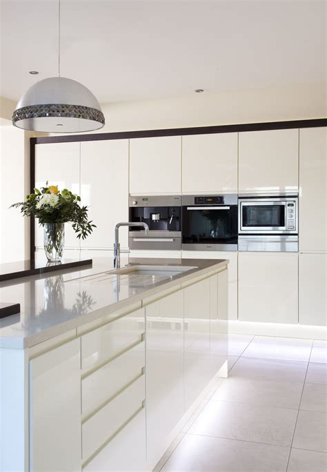 Sleek Lines With This White Gloss Handleless Kitchen And Silestone