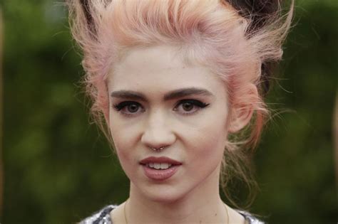 Grimes Knocked Up Shares Baby Bump Photo
