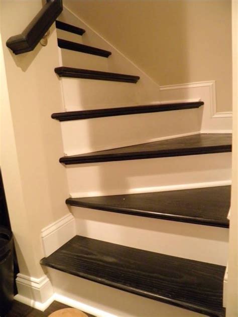 At the base of the steps there is a … Stair Steps Ideas| Basement Masters