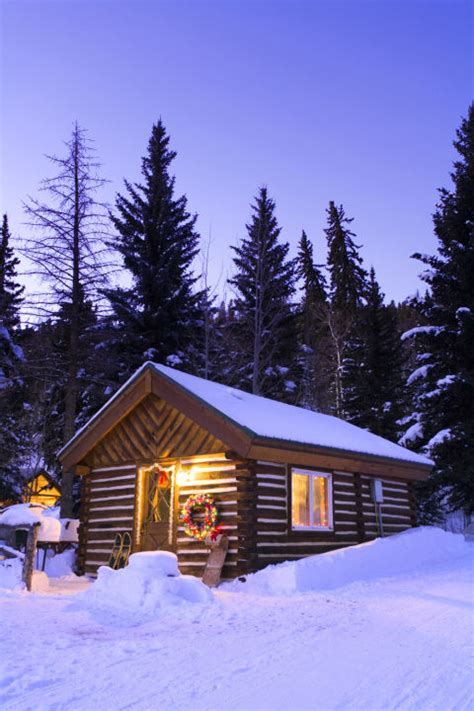 These Cozy Photos Of Log Cabins In The Snow Will Make You Feel Extra