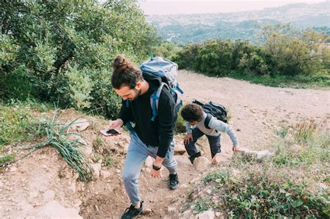 Two Friends Hiking Together Free Photo