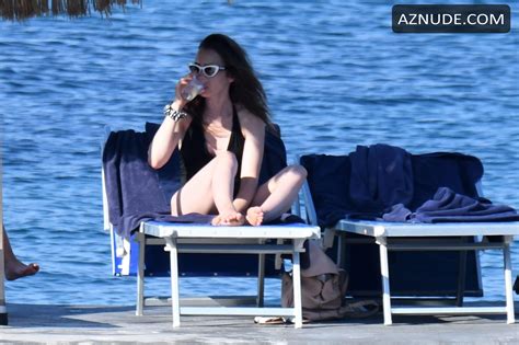 Lily Collins Sexy In A Black Swimsuit On Holiday In Ischia Aznude