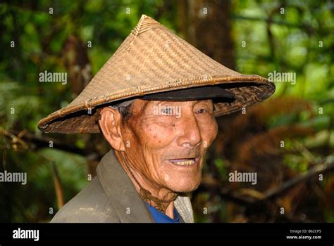 Portrait Of An Old Man Wearing A Typical Rice Hat Of The Phunoy Tribe