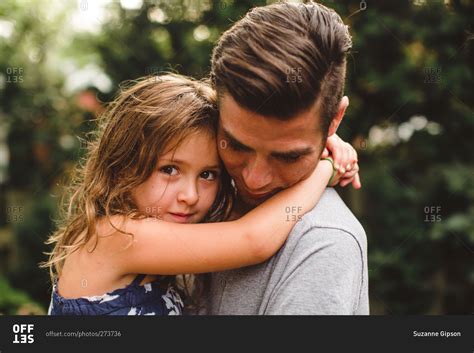 Little Girl Hugging Her Father Stock Photo Offset