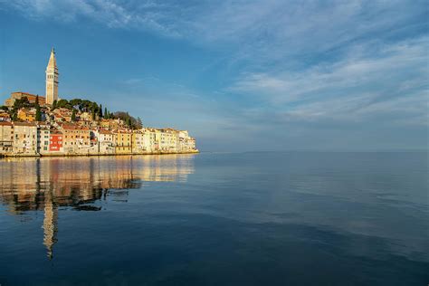 scenic reflection of the beautiful town rovinj in croatia photograph by cavan images fine art