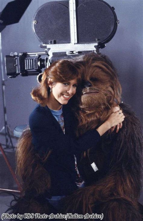 Carrie Fisher Sitting On Chewbaccas Lap 1983 Roldschoolcool
