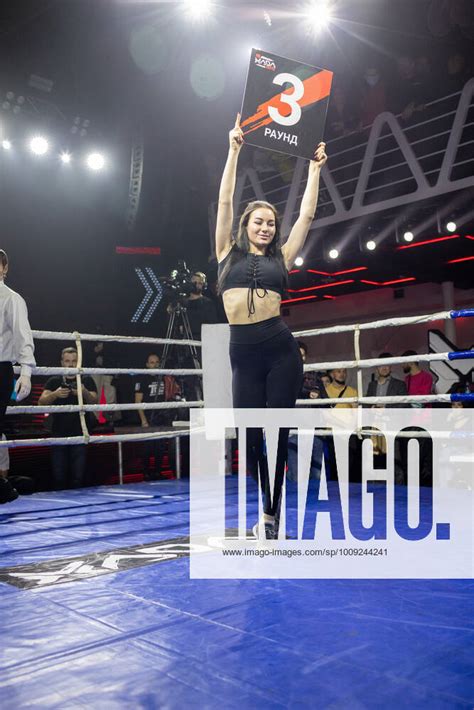boxing ring girl holding a board with round number during boxing kharkiv derby located in