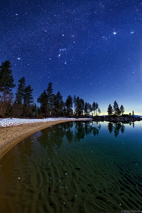 Winter Stars Reflect In Sand Harbor Lake Tahoe Wally Pacholka